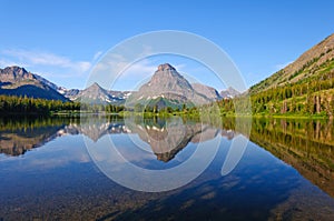 Western lake and Mountains in Early Morning