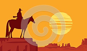 Western landscape with silhouette of a lone rider