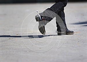 Western rider walking with spurs