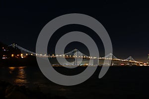 The western span of the Oakland Bay Bridge at night.