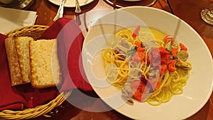 Western style dinner with bread and speghetti