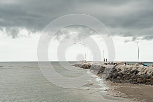 Western sunset shining on easterly clouds at Cha-um beach