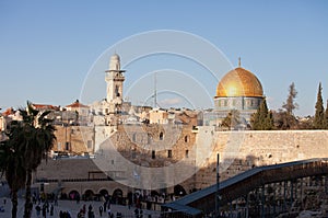 Western Wall and golden Dome of the Rock at sunset, Jerusalem Old City, Israel.