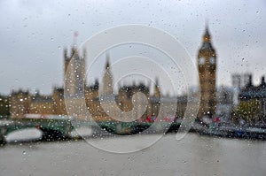 Westminster Palace and Big Ben through rain drops, London, Great Britain