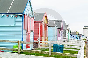WESTWARD HO!, DEVON, ENGLAND - 21 June 2021: Beach huts in Westward Ho! in Devon, England