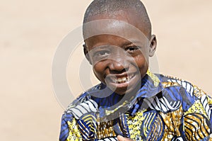 Wet African Black Boy Laughing Outdoors with Huge Smile.