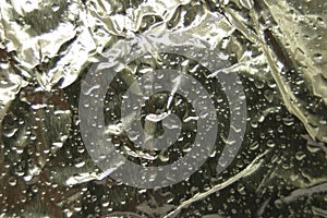 Wet Aluminum Foil With Water for Background