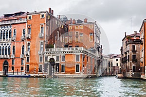 Wet apartment buildings in Venice in autumn rain