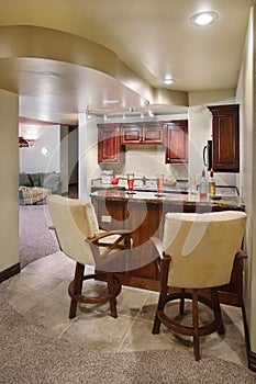 A wet bar in an upscale residential property photo