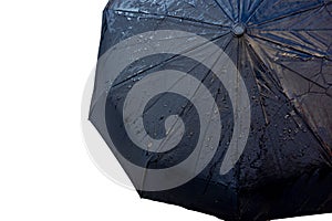 Wet black umbrella close up image on isolated background. Waterproof fabric cloth with water drops and splashes. Good or bad