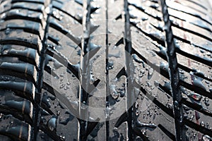 Wet car tyre (tire)