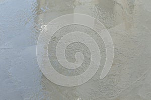 Wet cement texture in building construction site