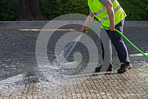 Wet cleaning of street