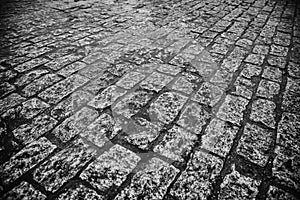 Wet cobblestone floor