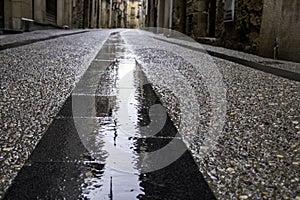 Wet cobblestone floor