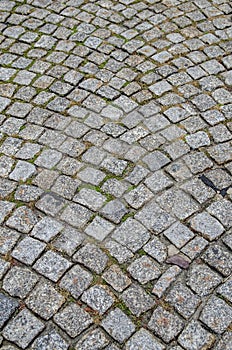 Wet cobblestone road