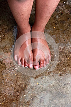 Wet feet of a child