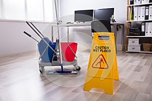 Wet Floor Caution Sign On Floor