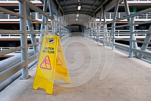 Wet floor sign on a corridor