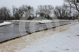 Wet fork in the road in thawing weather