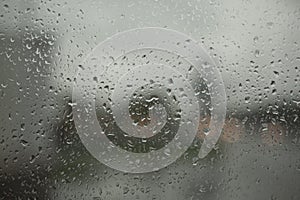 Wet glass. Raindrops on window. It's rainy day