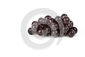 Wet grapes on white