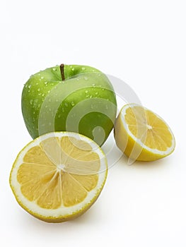 Healthy fruit with vitamins, green apple and lemon