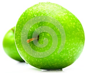 Wet green apples