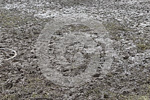 Wet mud with footprints Repetition of mud on wet ground