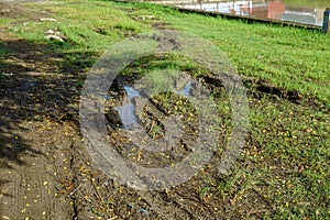 wet and muddy roads stagnated with water in the countryside