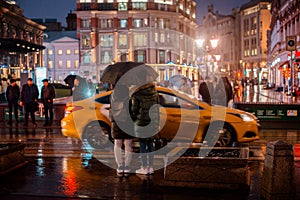 Wet night city street rain Bokeh reflection bright colorful lights puddles sidewalk Car