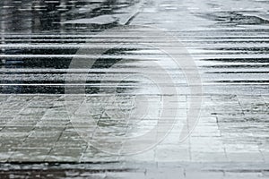 Wet pavement and asphalt road during rain