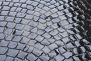 Wet pavement stone block