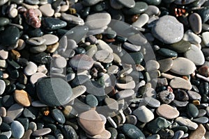 Wet pebbles on a shingle beach