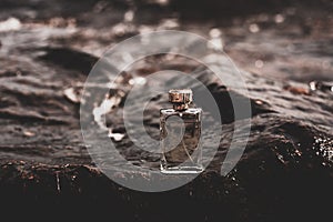 Wet perfume on stone