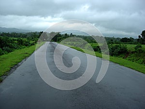 Wet road in countryside