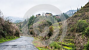 wet road and view of Dazhai village