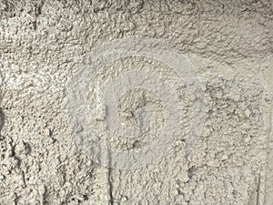 Wet rough concrete floor as texture background