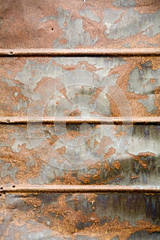 Wet rusty tin