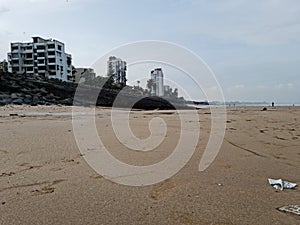 Wet sand on the eco sensitive sea beach photo