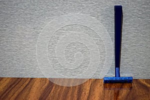 Wet shave razor on a wooden table