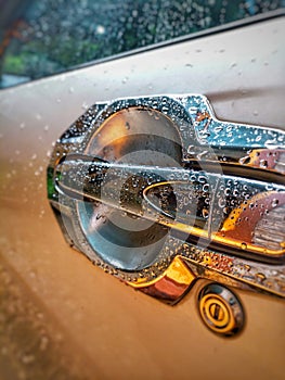 Wet and shiny car door handle