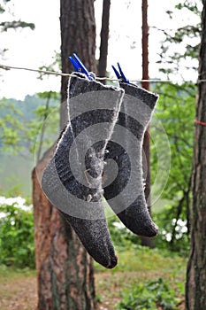 Wet socks drying on a rope