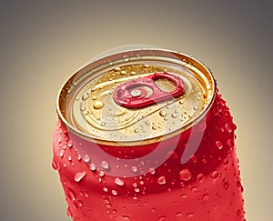 Wet surface of a red metal can with a cold drink close-up