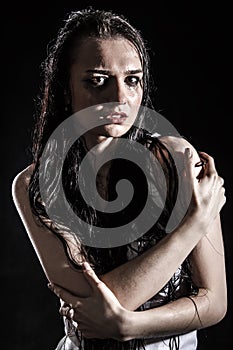 Wet upset woman with a flowed ink