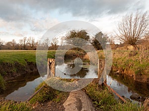 wet waterlogged country farm land stream eddy