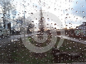 Wet window, water trickles photo