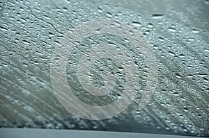 wet windshield of a car. autumn mood, Abstract soft focus photo. rainy weather.