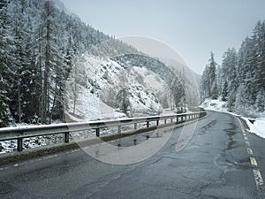 Wet winter road in Alpine