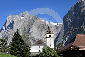 Wetterhorn Mountain and church in Jungfrau Alps photo